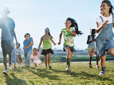 Photo of kids running up a hill