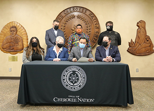 Members of Cherokee Nation signing proclamation to recognize Autism Awareness Month
