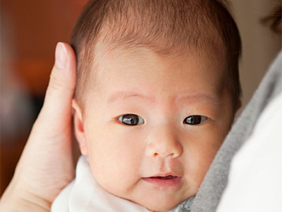 Baby being held