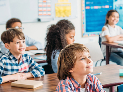 Kids in a classroom, listening