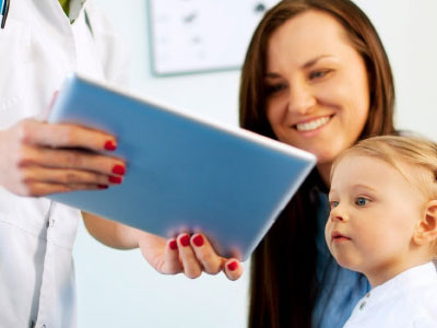 Baby and mother with doctor